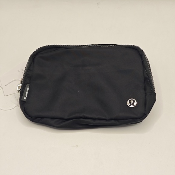 lululemon athletica Handbags - lululemon athletica Black Small Zip Pouch